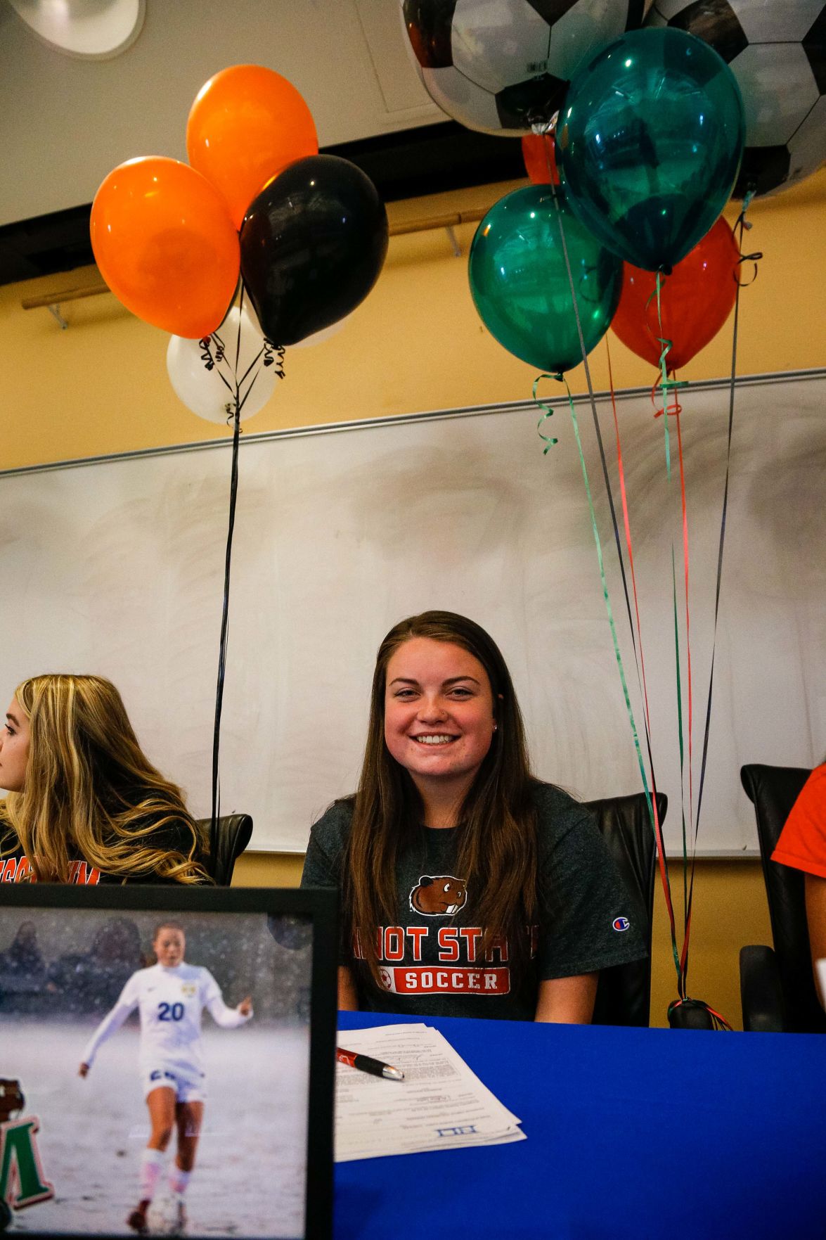 SIGNING DAY: Rampart athletes sign their National Letter of Intent